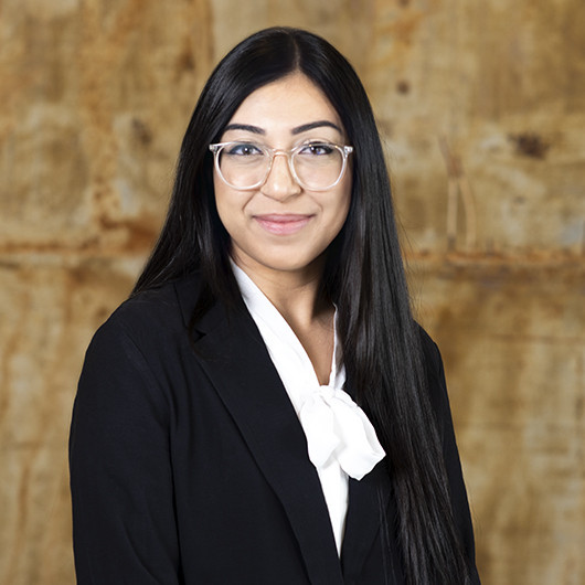 Headshot photo of Loriza Khan